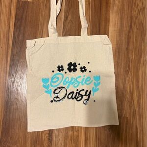 Oopsie Daisy Cream Tote Bag
